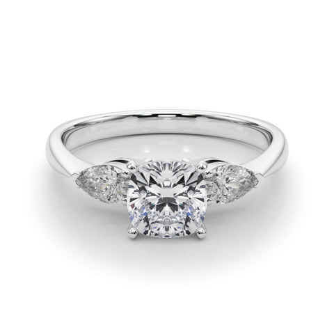 White gold Three-Stone Cushion Diamond Ring with Pear Side Stones on a Platinum Band with Four-Prong Setting