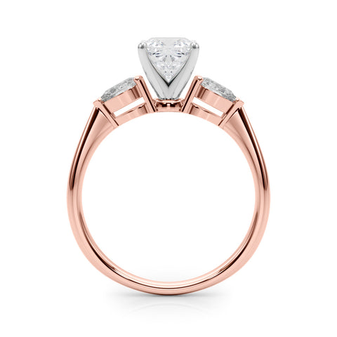 Rose gold Three-Stone Cushion Diamond Ring with Pear Side Stones on a Platinum Band with Four-Prong Setting