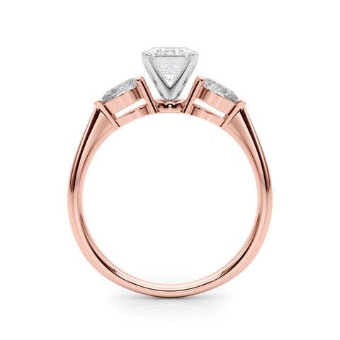 Rose gold Three-Stone Radiant Diamond Ring with Pear Side Stones on a Platinum Band with Four-Prong Setting