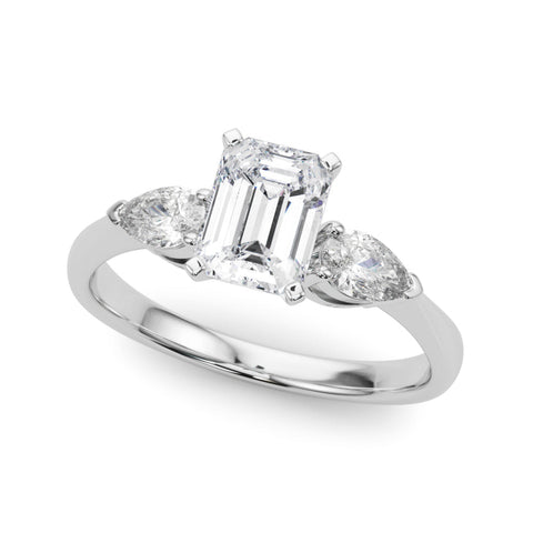Platinum Three-Stone Radiant Diamond Ring with Pear Side Stones on a Platinum Band with Four-Prong Setting