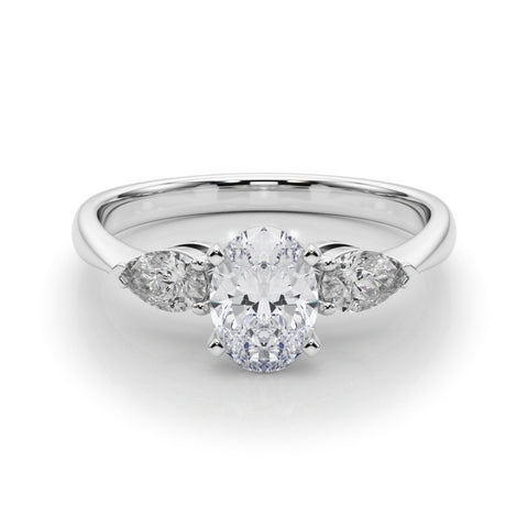 White gold Three-Stone Oval Diamond Ring with Pear Side Stones on a Platinum Band with Four-Prong Setting