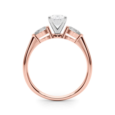 Rose gold Three-Stone Oval Diamond Ring with Pear Side Stones on a Platinum Band with Four-Prong Setting