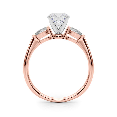 Rose gold Three-Stone Heart Diamond Ring with Pear Side Stones on a Platinum Band with Four-Prong Setting