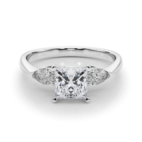 Platinum Three-Stone Princess Diamond Ring with Pear Side Stones on a Platinum Band with Four-Prong Setting