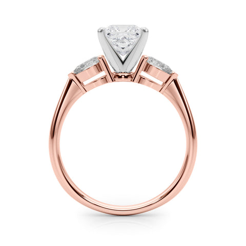 Rose gold Three-Stone Princess Diamond Ring with Pear Side Stones on a Platinum Band with Four-Prong Setting