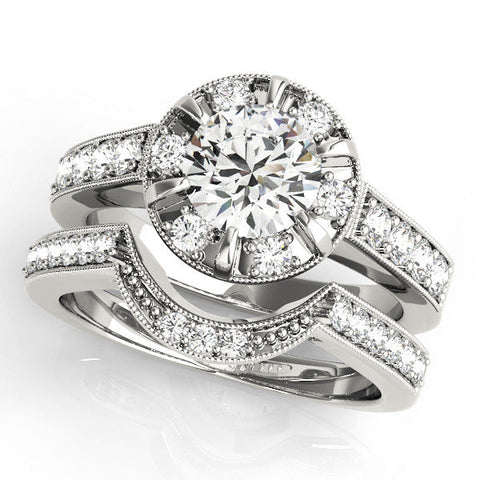 Platinum Round Halo Diamond Engagement Ring with Pave Band and Claw Prong Setting