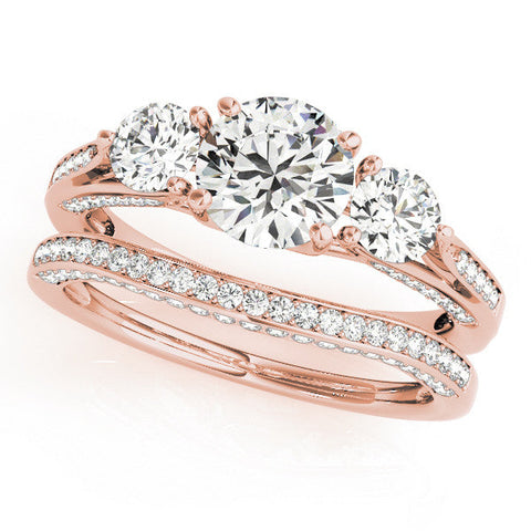 Rose gold Round Brilliant Three-Stone Engagement Ring with Split Shank and Prong Setting