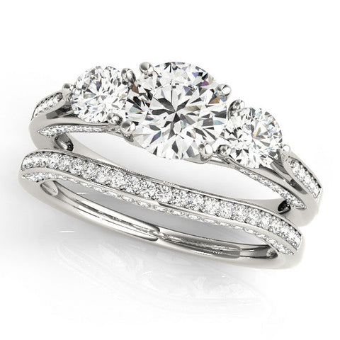 Platinum Round Brilliant Three-Stone Engagement Ring with Split Shank and Prong Setting