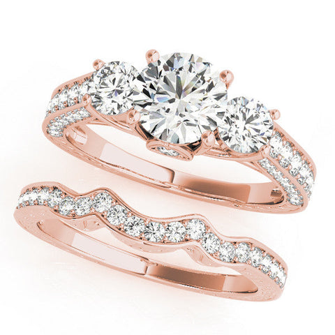 Rose gold Three-Stone Round Cut Diamond Engagement Ring with Split Shank and Prong Setting