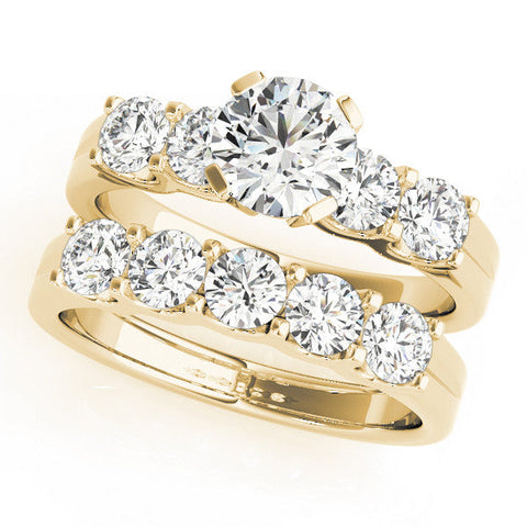 Yellow gold Pear Brilliant Cut Diamond Five-Stone Prong Set Engagement Ring with Channel Band