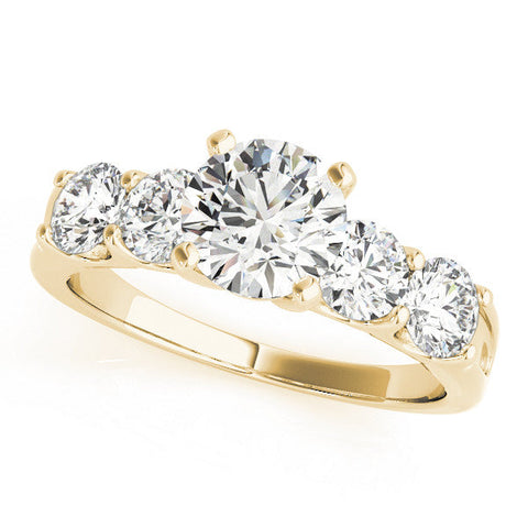 Yellow gold Emerald Brilliant Diamond Five-Stone Engagement Ring with Prong Setting on a Classic Band