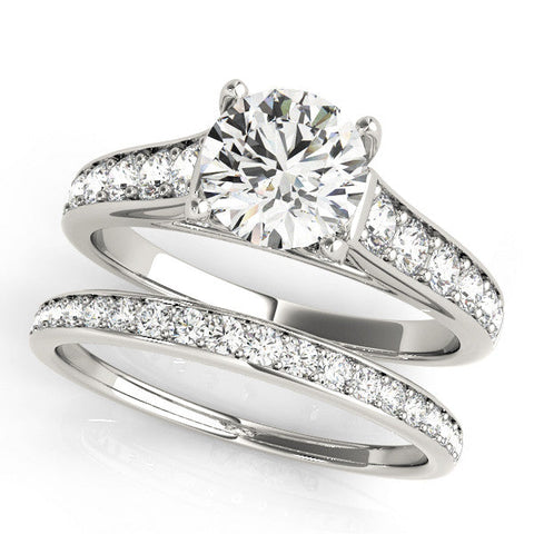 Platinum Heart Brilliant Cut Diamond Engagement Ring with Pavé Band and Four-Prong Setting