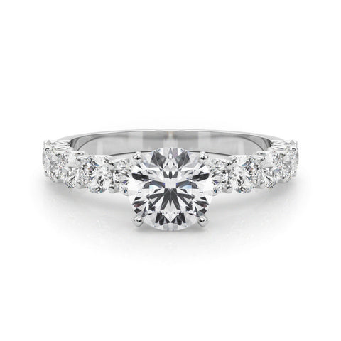 Silver Heart Diamond Prong Setting with Side Stones on a Pave Band
