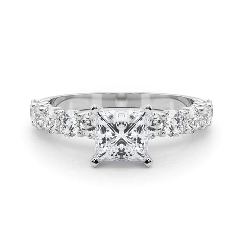 Silver Princess Diamond Prong Setting with Side Stones on a Pave Band