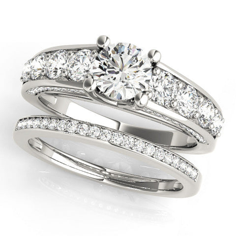 White gold Round Brilliant Channel-Set Diamond Engagement Ring with Split Shank and Four-Prong Setting