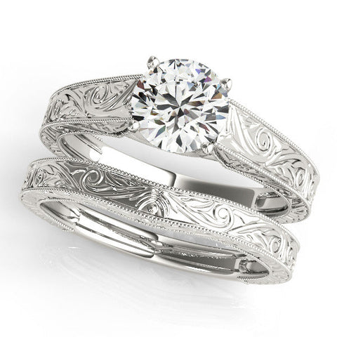 White gold Round Solitaire Diamond with Engraved Band and Four-Prong Setting