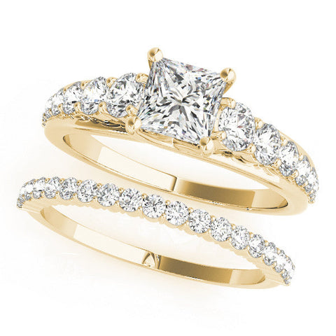 Yellow gold Emerald Cut Diamond Engagement Ring with Pavé Band and Four-Prong Setting
