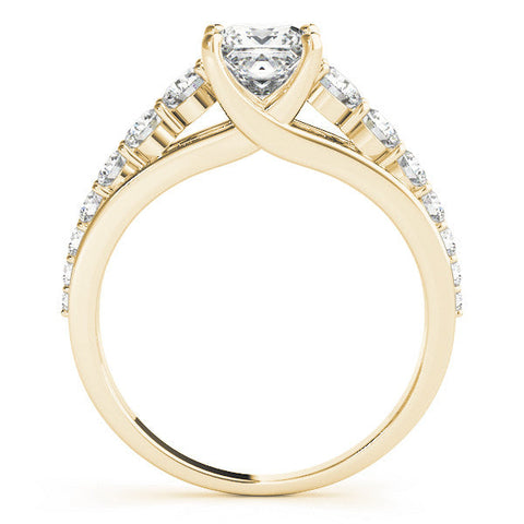 Yellow gold Pear Cut Diamond Engagement Ring with Pavé Band and Four-Prong Setting