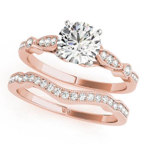 Rose gold Heart Cut Diamond with Milgrain Marquise and Bezel Accents on a Solitaire Band with Prong Setting