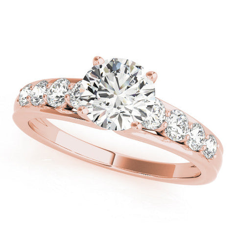 Rose gold Princess Brilliant Solitaire with Side Stones on a Pave Band and Four-Prong Setting