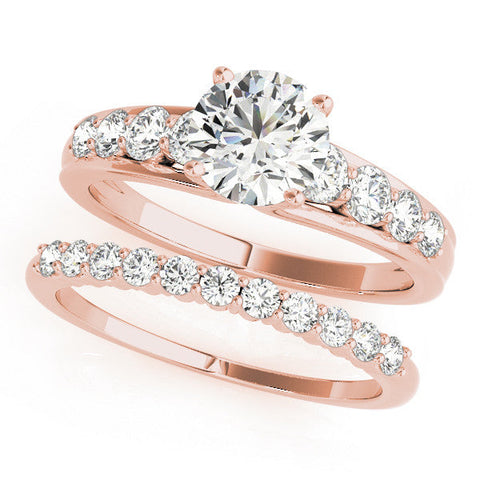 Rose gold Princess Brilliant Solitaire with Side Stones on a Pave Band and Four-Prong Setting