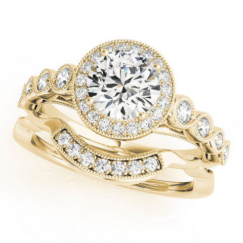 Yellow gold Round Halo Milgrain Solitaire with Bezel Set Side Stones and Pave Band