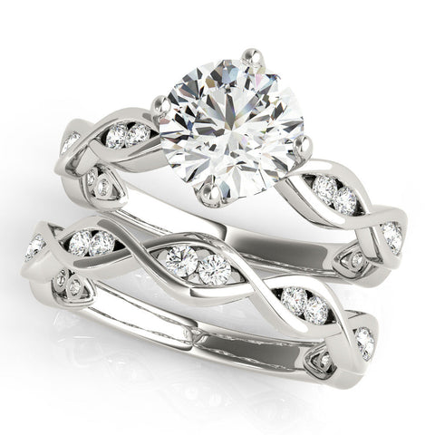 White gold Round Solitaire Twist Band with Leaf Prong Setting