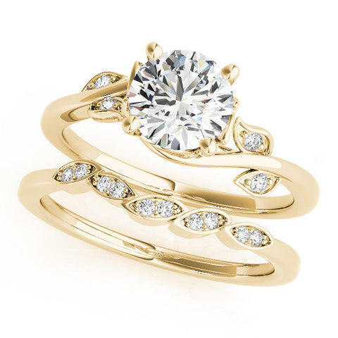 Yellow gold Round Solitaire Twist Engagement Ring with Leaf Accents and Prong Setting
