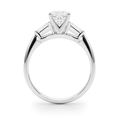 White gold Cushion Solitaire with Tapered Baguette Side Stones on a Classic Band with Four-Prong Setting