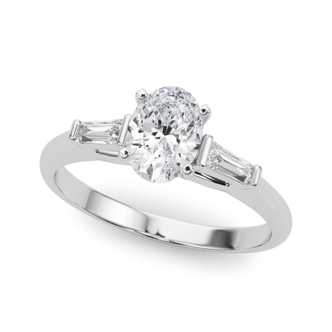 White gold Oval Solitaire with Tapered Baguette Side Stones on a Classic Band with Four-Prong Setting