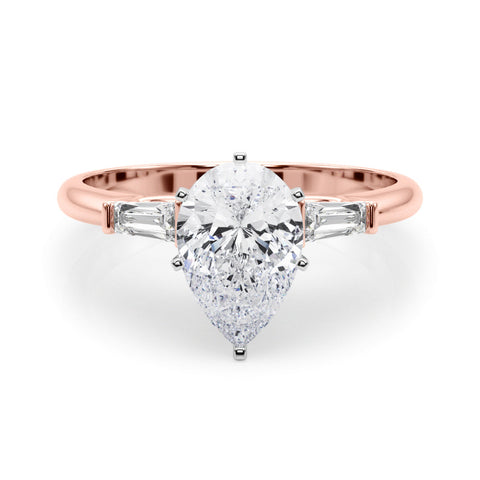 Rose gold Pear Solitaire with Tapered Baguette Side Stones on a Classic Band with Six-Prong Setting