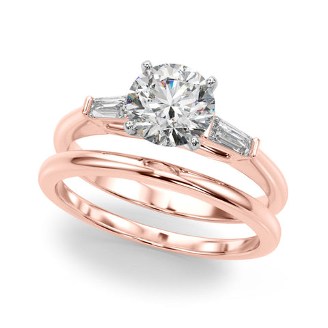 Rose gold Round Solitaire with Tapered Baguette Side Stones on a Classic Band with Four-Prong Setting