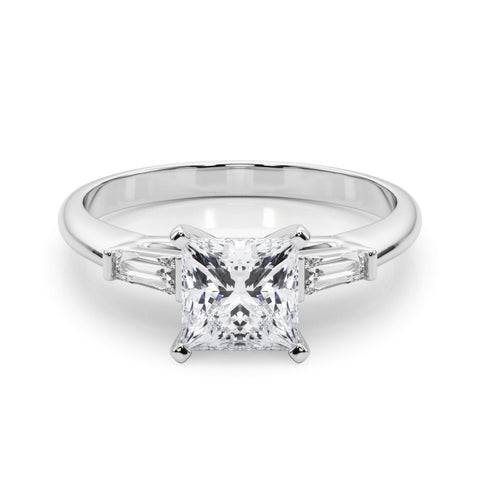 Platinum Princess Solitaire with Tapered Baguette Side Stones on a Classic Band with Four-Prong Setting
