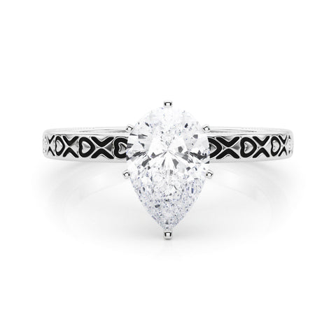 White gold Pear Solitaire Diamond Engagement Ring with XO Engraved Band and Four-Prong Setting