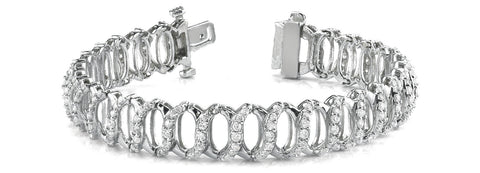 White gold Diamond Oval Link Tennis Bracelet with Round Cut Stones and Shared Prong Setting