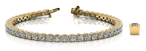 Yellow gold Round Cut Diamond Tennis Bracelet with Channel Set Band and Four-Prong Setting