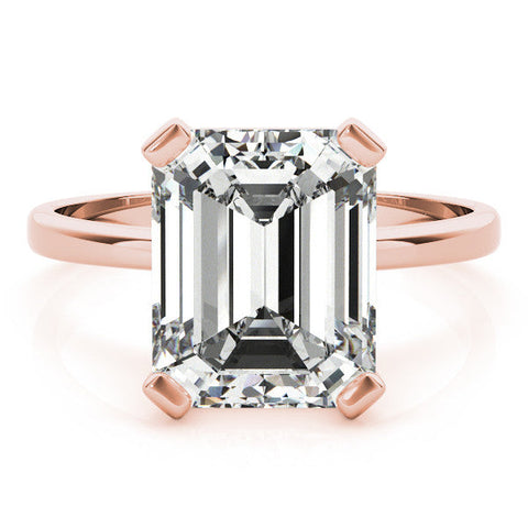Rose gold Emerald Cut Solitaire Ring with Four-Prong Setting and Classic Band