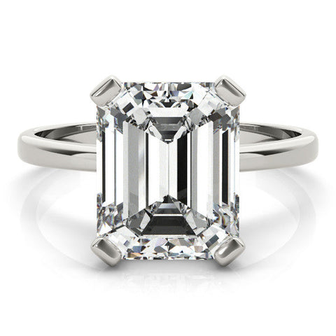 Platinum Emerald Cut Solitaire Ring with Four-Prong Setting and Classic Band