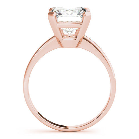 Rose gold Emerald Cut Solitaire Ring with Four-Prong Setting and Classic Band