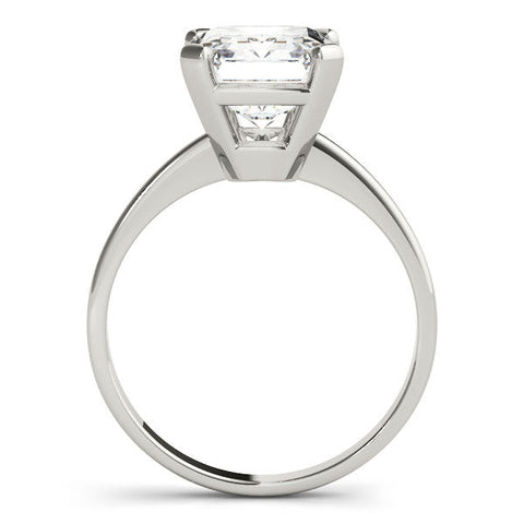 Platinum Emerald Cut Solitaire Ring with Four-Prong Setting and Classic Band