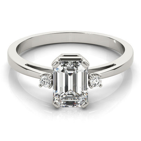 White gold Emerald Cut Three-Stone Solitaire Ring with Round Accent Diamonds and Four-Prong Setting