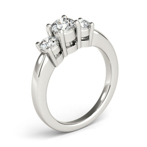 Platinum Three-Stone Round Cut Solitaire Ring with Cathedral Band and Four-Prong Setting