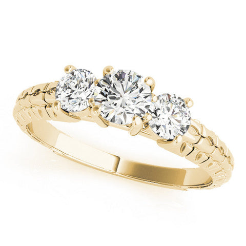 Yellow gold Three-Stone Heart Cut Diamond Ring with Channel-Set Band and Prong Setting