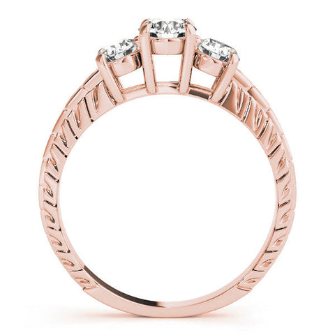 Rose gold Three-Stone Emerald Cut Diamond Ring with Channel-Set Band and Prong Setting