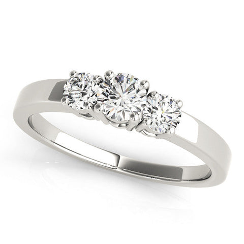 Platinum Three-Stone Round Diamond Solitaire Ring with Channel Set Band and Four-Prong Setting