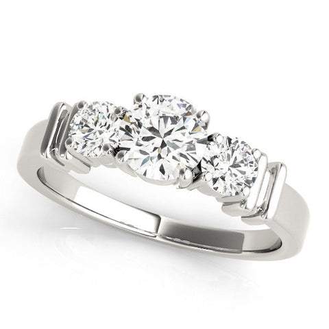 Platinum Three-Stone Round Diamond Solitaire Ring with Channel Band and Prong Setting