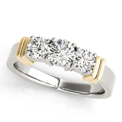 Yellow gold Three-Stone Round Brilliant Channel Set Diamond Ring with Bar Prong Setting
