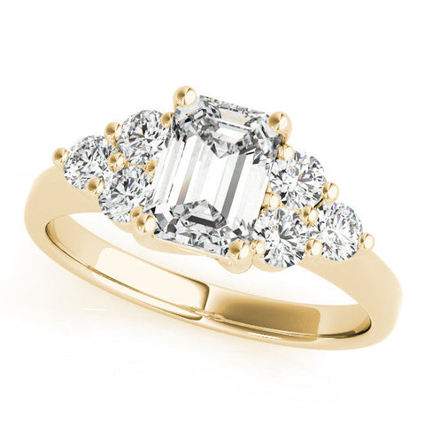 Yellow gold Emerald Cut Diamond Cluster Ring with Round Accent Stones and Prong Setting on a Classic Band