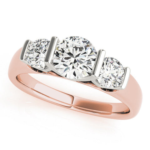 Rose gold Three-Stone Round Brilliant Diamond Ring with Channel Setting and White Gold Band