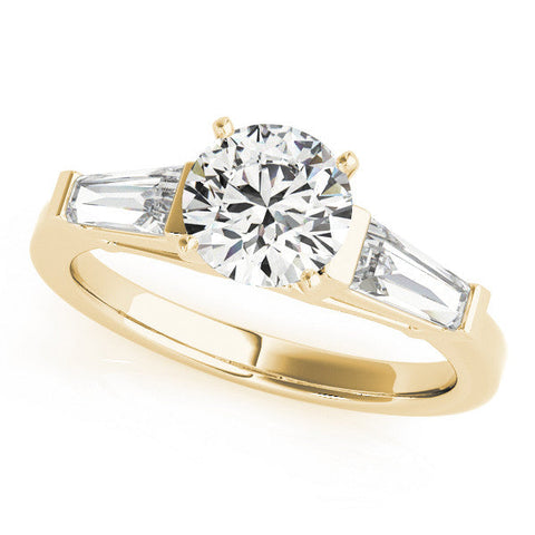 Yellow gold Heart Cut Diamond Solitaire Ring with Tapered Baguette Accents and Four-Prong Setting